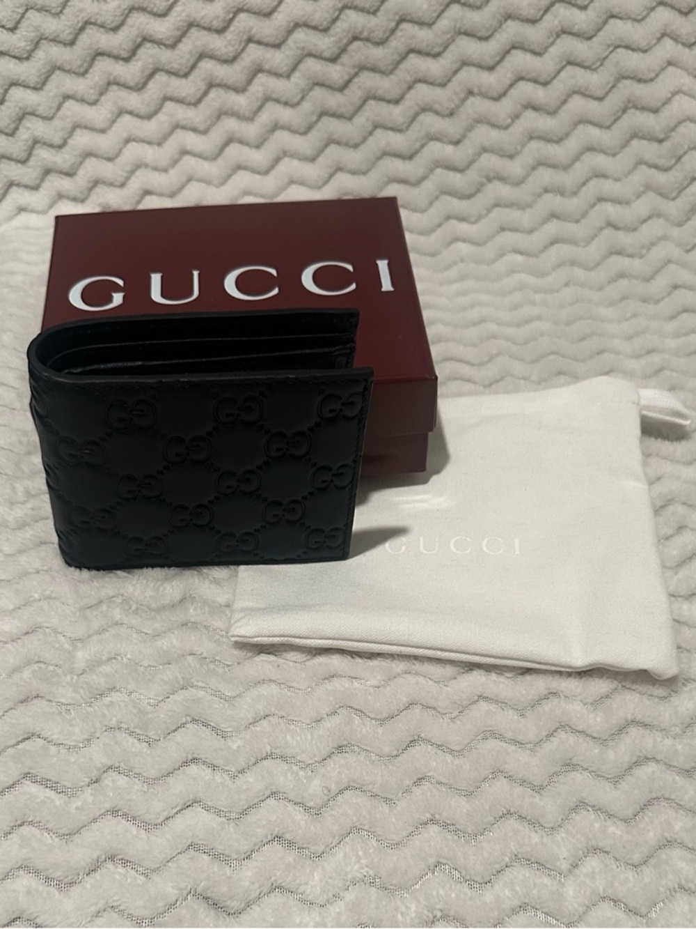 Gucci Black Embossed Leather Bi-Fold Wallet